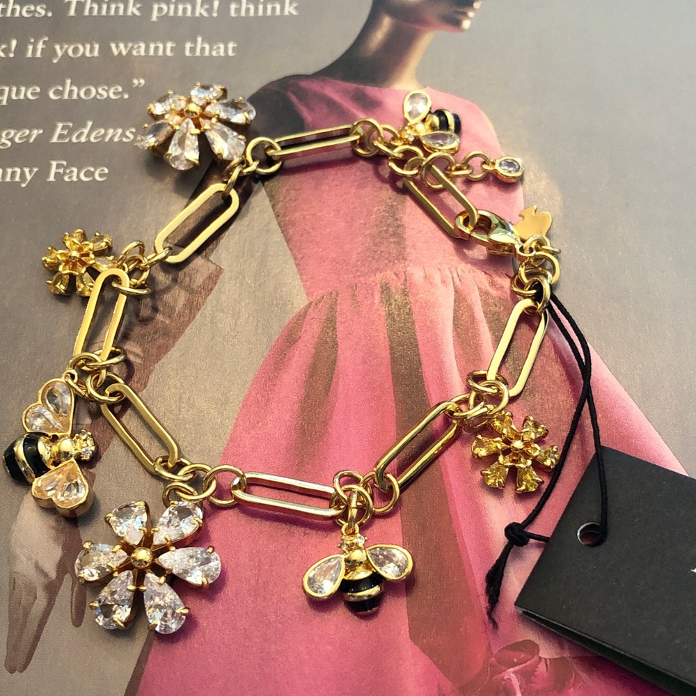 Authentic kate spade New with tag. Gold-Tone Crystal Flower & Bee Charm Bracelet